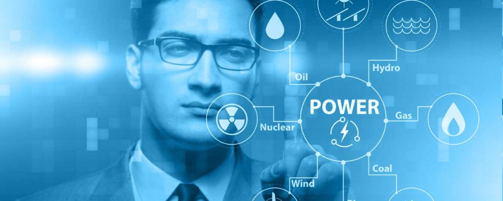 Image of man staring at grpahic of different energy sources